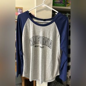 A medium Shein long sleeve shirt. Worn a few times but no stains or rips!